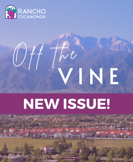 Promotional graphic for the City of Rancho Cucamonga's Off the Vine newsletter. The background features a scenic view of the San Gabriel Mountains above a residential neighborhood. The City of Rancho Cucamonga logo appears in the upper left corner. Centered text reads, "Off the Vine," with a purple banner below displaying the words "NEW ISSUE!" in white capital letters.