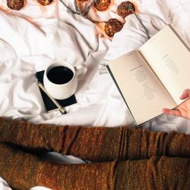 Reader with coffee and a book