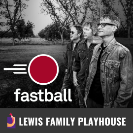 Promotional graphic for Fastball. Image shows three band members standing outdoors in a black and white setting with trees and open landscape behind them.    Footer text reads: “Lewis Family Playhouse.” 