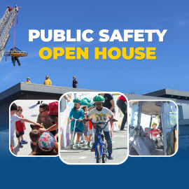 Promotional graphic for a Public Safety Open House. Large white and yellow text reads, "Public Safety Open House," against a blue sky background. A fire department ladder extends from the upper left corner with a firefighter suspended in a rescue basket. Three public safety personnel stand on a rooftop below. Along the bottom are three rounded photos: a firefighter interacting with children, children riding bicycles while wearing helmets on a safety course, and a child seated inside the cab of a public work