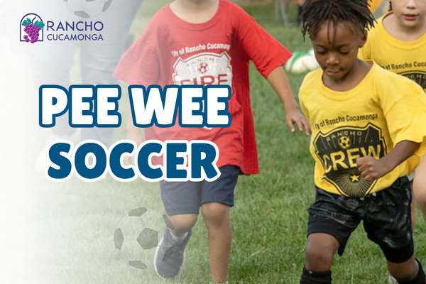Promotional graphic for Pee Wee Soccer featuring young children running and kicking soccer balls on a grassy field. The Rancho Cucamonga logo appears at the top left, large bold text reads ‘Pee Wee Soccer,’ and the bottom banner displays the website RCpark.com.
