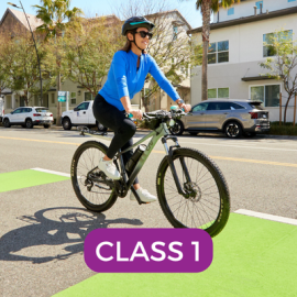 woman on ebike with helmet